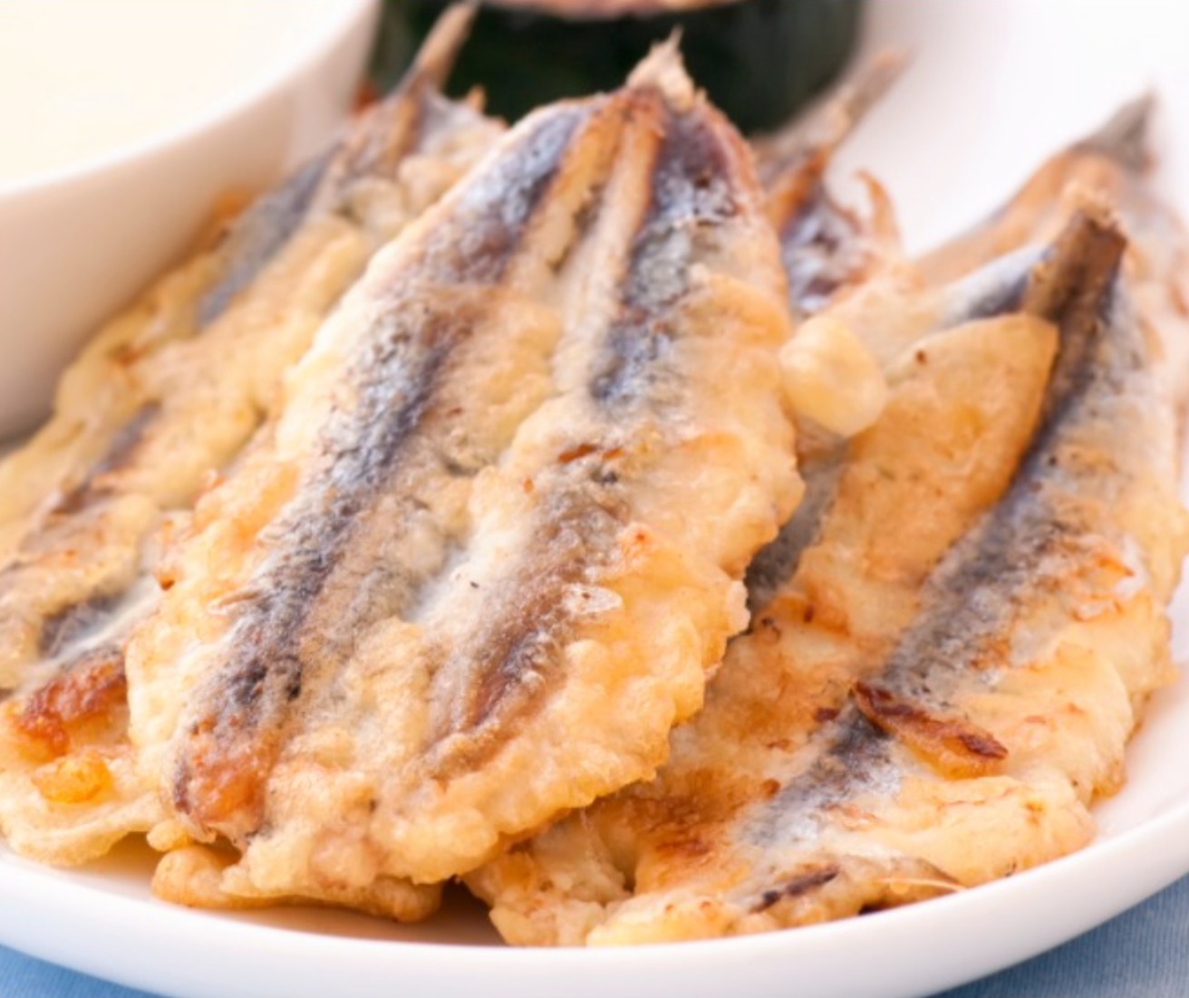 Seitons arrebossats amb maionesa d’herbes