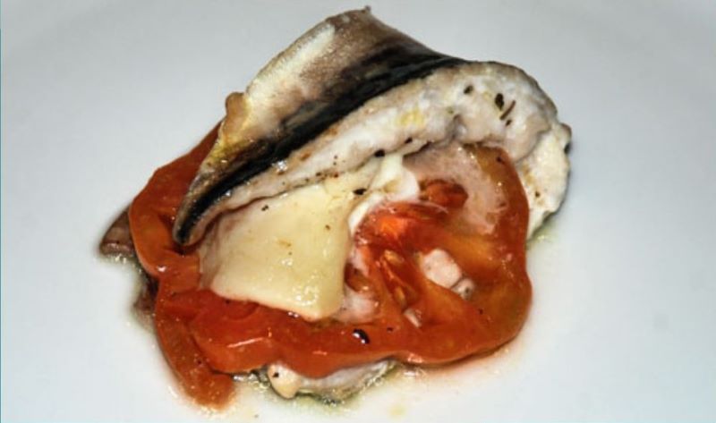 Verats amb formatge de cabra, tomàquet i herbes